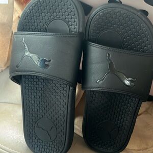 Puma Black Slides, size 6, good condition.
